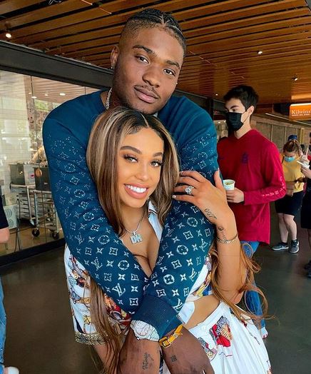 Dwayne Haskins with wife