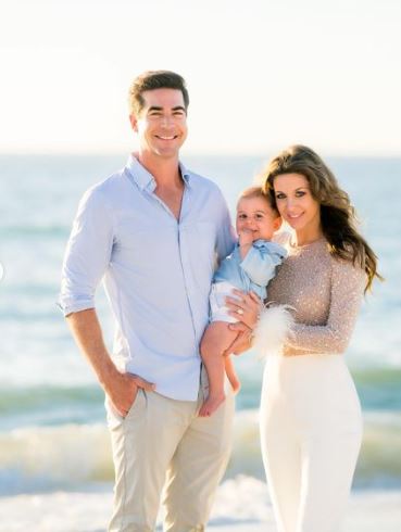 Jesse Watters with his wife Emma and child