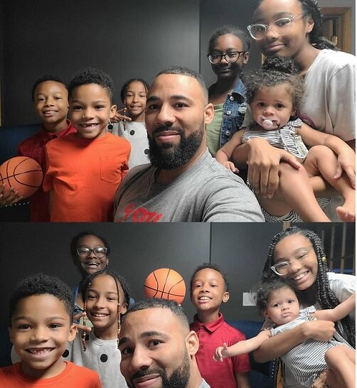 Marcus-roger-with-kids Marcus Roger with his kids